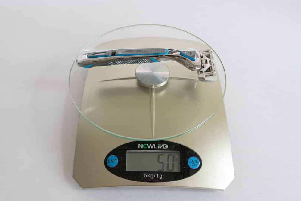 measuring the dollar shave club razor weight on a scale