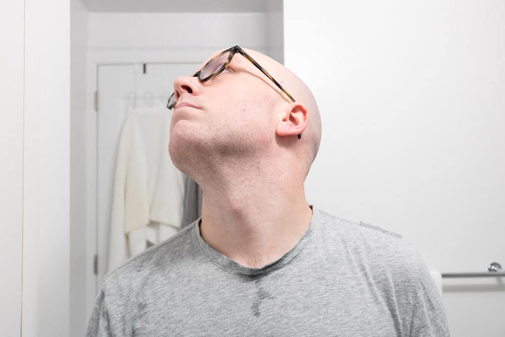 man looking up to expose neck after shaving with edwin jagger de89