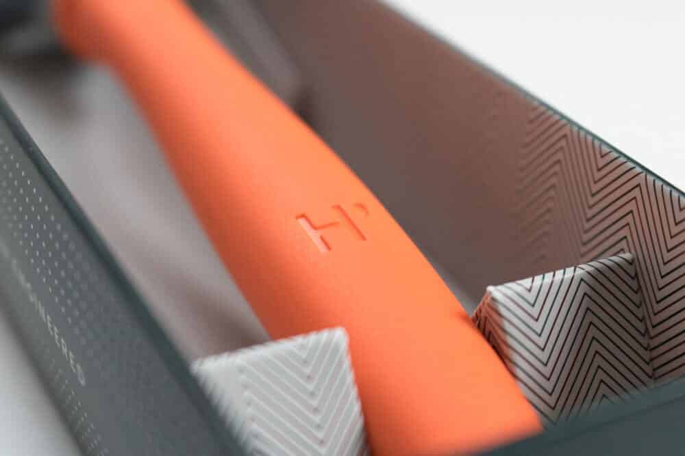 closeup of the H logo on razor handle
