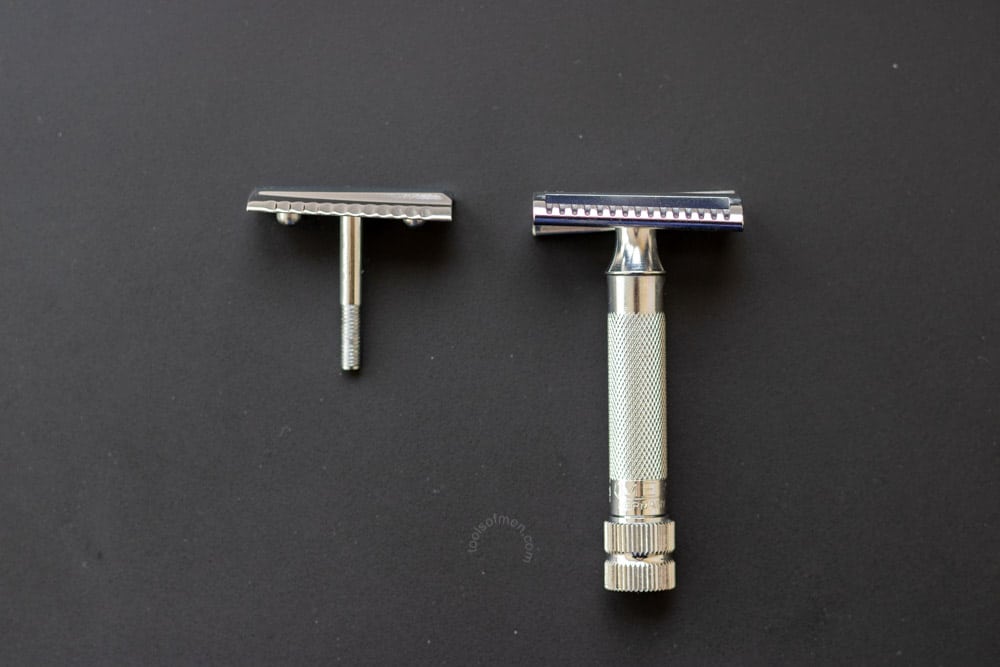 merkur 37c disassembled on black mat