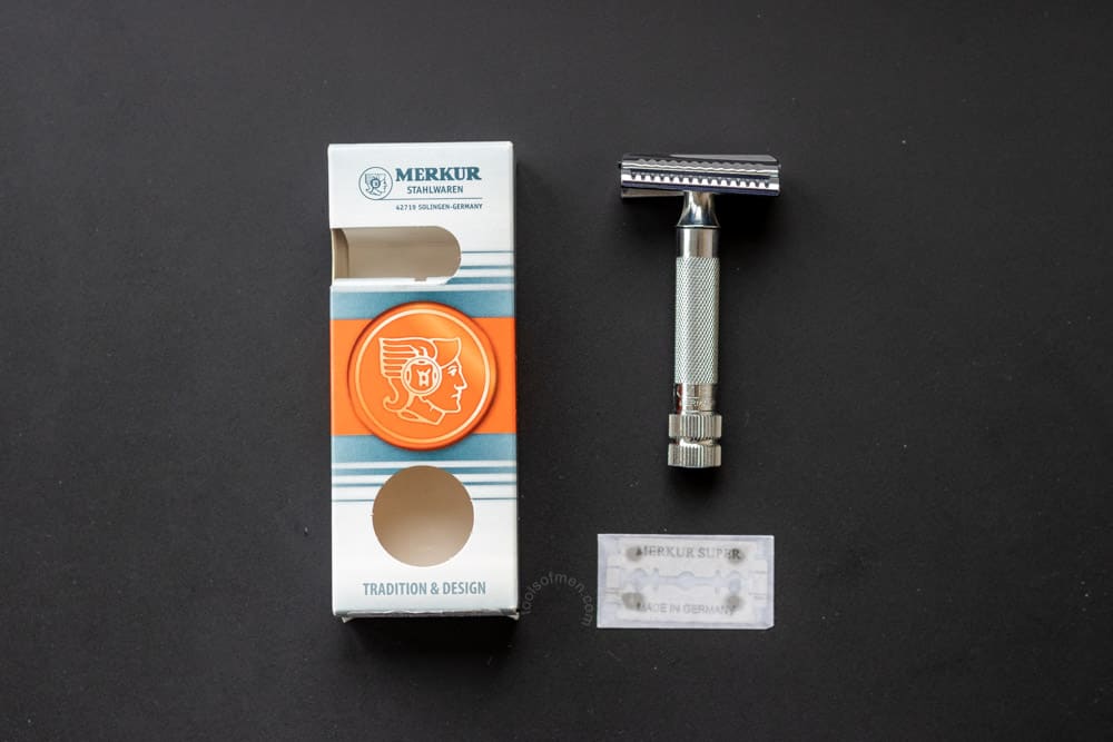 packaging box included razor blade and merkur 37c next to each other on black mat