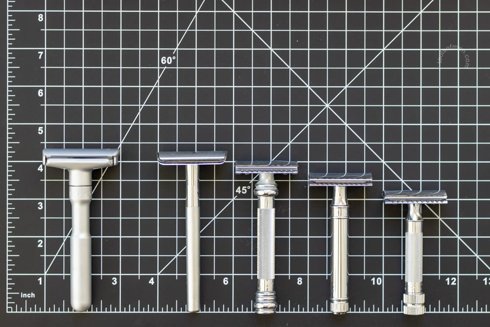 merkur futur on a black measuring mat next to other razors
