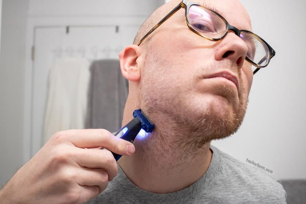 man shaving neck with microtouch solo