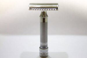 single safety razor standing upright